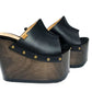 Vintage 70s-style black leather clogs with super high wooden wedge heels. Handmade to order.
Available in sizes 34 to 47.
An exclusive design by Sol Caleyo, created for those who value craftsmanship, comfort, and authentic style.