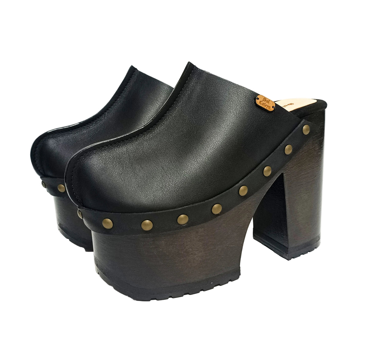 Black leather clogs with platform and super high heel. Leather mule with super high wooden heel. Black leather clogs 70's vintage style. Vintage style super high heel clogs. Sizes 34 to 47. High quality leather shoes handmade by sol Caleyo. Sustainable fashion.