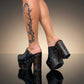 Black leather clogs with platform and super high heel. Leather mule with super high wooden heel. Black leather clogs 70's vintage style. Vintage style super high heel clogs. Sizes 34 to 47. High quality leather shoes handmade by sol Caleyo. Sustainable fashion.