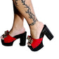 Handmade smooth red leather peep toe platform mule sandals with leopard print leather bow, old-gold studs and 12 cm straight wenge lacquered wooden heel by Sol Caleyo.