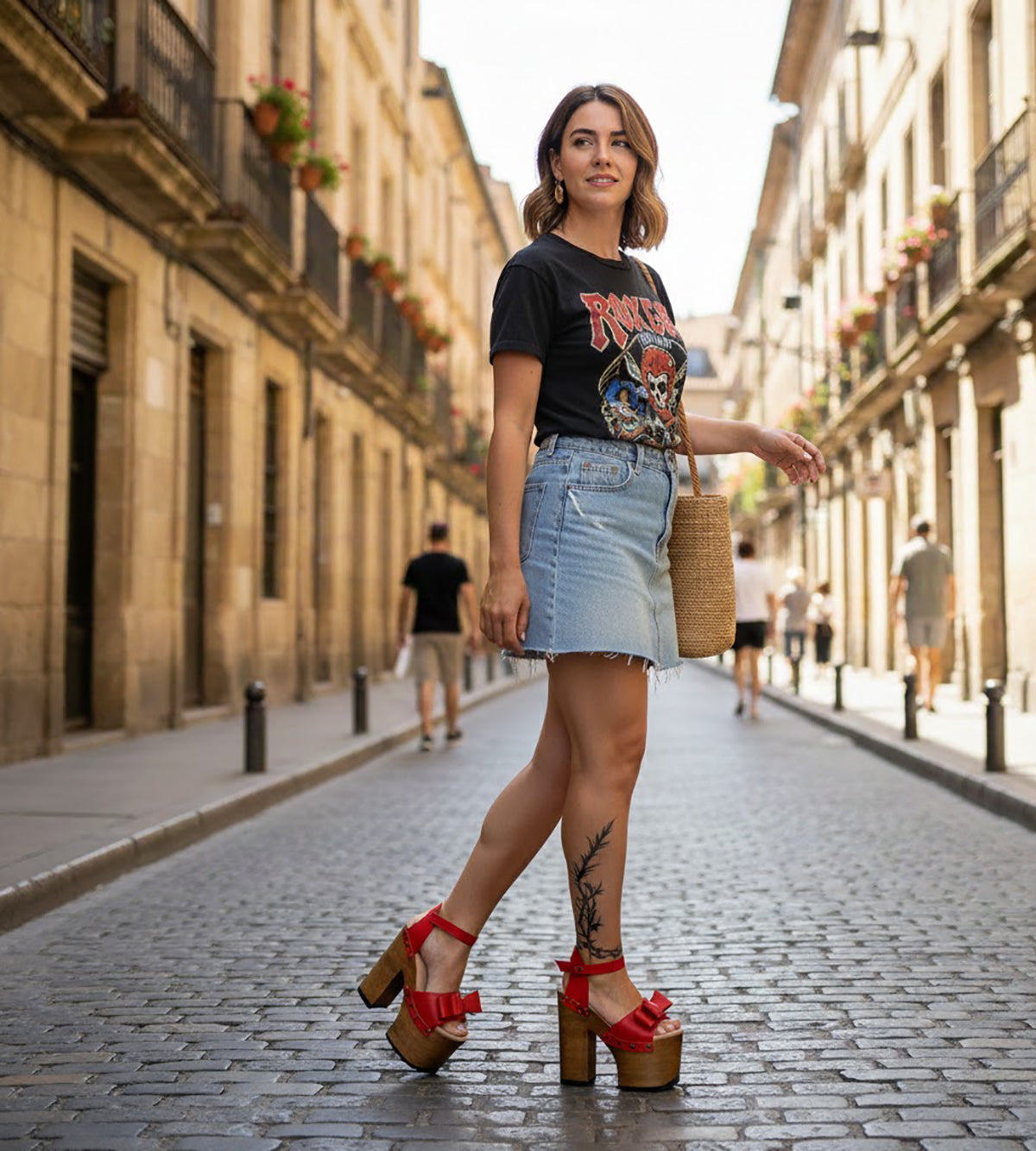 Handmade smooth red leather open toe platform sandals with red leather bow over the toes, ankle strap, old-gold studs and 17 cm straight natural lacquered wooden heel by Sol Caleyo.