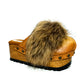Hand-aged sand leather wedge mule clogs with natural fur trim and gold-tone studs by Sol Caleyo