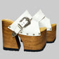 Individually handcrafted White Western Sandals showing the 17cm hand-carved wooden platform and ornate silver buckle on a white background.