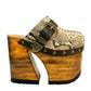 Profile view of Route 66 XL Snake Natural clogs with 17cm natural wood platform heel, snake print leather, and antique brass buckle.