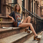 Profile view of Route 66 XL Snake Natural clogs with 17cm natural wood platform heel, snake print leather, and antique brass buckle.