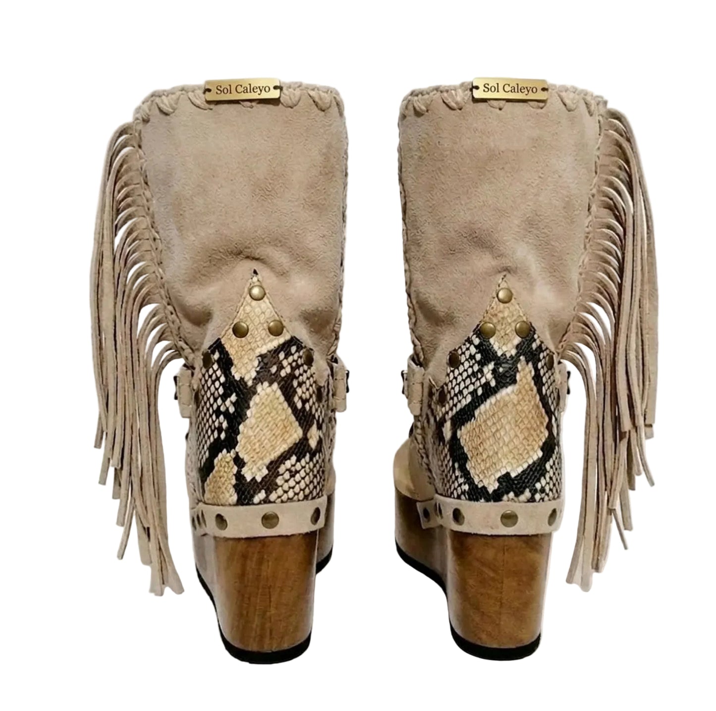 Atenea Flip Flop Boots by Sol Caleyo in neutral beige suede, featuring boho fringes, shell decorations, snake-print heel, and a tall wooden platform sole.