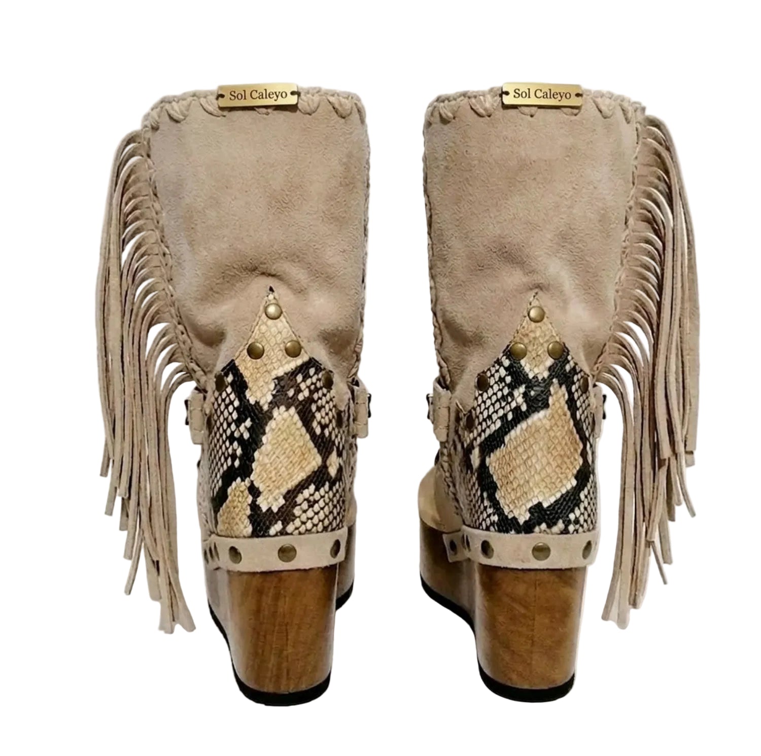 Atenea Flip Flop Boots by Sol Caleyo in neutral beige suede, featuring boho fringes, shell decorations, snake-print heel, and a tall wooden platform sole.