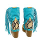 Handmade Atenea Turquoise Flip Flop Boots by Sol Caleyo, featuring vibrant turquoise suede, bohemian fringes, shell embellishments, and a tall wooden platform.