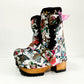 Handmade tattoo print leather biker platform boots with antique-gold buckles, heel rivets and 6.5 cm wooden heel by Sol Caleyo.