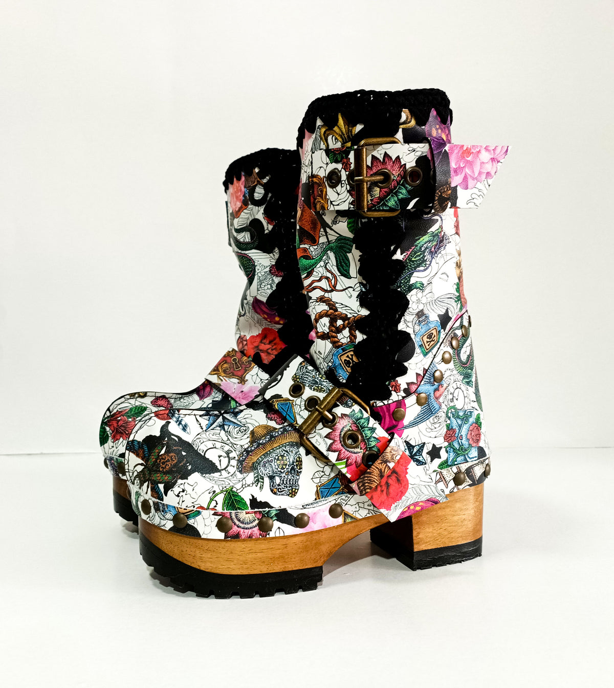 Handmade tattoo print leather biker platform boots with antique-gold buckles, heel rivets and 6.5 cm wooden heel by Sol Caleyo.