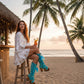 Turquoise handmade suede boho platform boots with fringe, feathers, shells and 12 cm wooden heel by Sol Caleyo.