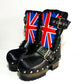 Handmade black leather biker platform boots with UK flag lambskin detail, silver buckles, studs and 6.5 cm wenge wooden heel by Sol Caleyo.