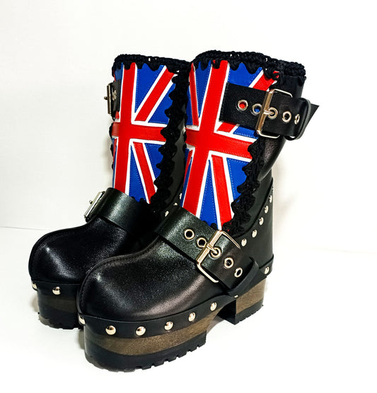 Handmade black leather biker platform boots with UK flag lambskin detail, silver buckles, studs and 6.5 cm wenge wooden heel by Sol Caleyo.