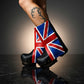 Handmade black leather pull-on mid-calf clog boots with UK flag patchwork, antique gold studs and 6 cm wenge wooden heel by Sol Caleyo.