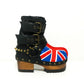 Handmade black leather UK flag platform ankle boots with antique-gold studs, buckles and 7 cm wooden heel by Sol Caleyo.