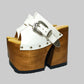 Individually handcrafted White Western Sandals showing the 17cm hand-carved wooden platform and ornate silver buckle on a white background.