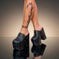 Black leather clogs with platform and super high heel. Leather mule with super high wooden heel. Black leather clogs 70's vintage style. Vintage style super high heel clogs. Sizes 34 to 47. High quality leather shoes handmade by sol Caleyo. Sustainable fashion.