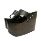 Pair of Sol Caleyo Kauai XL handcrafted flip flop sandals featuring black genuine leather straps, silver studs, and a high wengue-colored wooden platform sole.