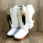 White handmade boho leather and rabbit fur wedge boots with carved bone, shells and feathers by Sol Caleyo
