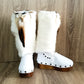 White handmade boho leather and rabbit fur wedge boots with carved bone, shells and feathers by Sol Caleyo