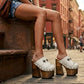 White handmade full-grain leather mule clogs with fringe, antique silver conchos and 17 cm wooden heel by Sol Caleyo