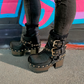 Black leather platform boots with silver studs. Black leather biker style boots with buckles. Black leather ankle boots with vintage style buckles. Leather boots with wooden heel. High-end handmade footwear by Sol Caleyo.