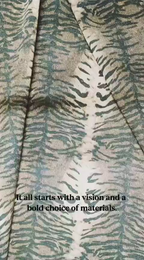 Sol Caleyo Tiger Boots - Handcrafted tiger-print suede boots with 3.5-inch wooden platform and antique gold buckle.