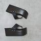 Black flip flop style platform clog sandal. Platform wedge. Black leather flip flop style sandal. Sizes 34 to 47. High quality leather shoes handmade by Sol Caleyo.