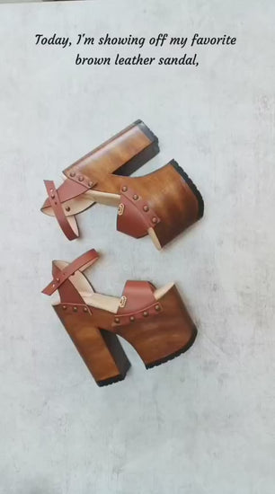 Handcrafted brown leather clogs sandals with wooden soles, high platforms, and heels