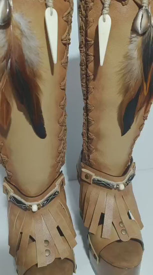 Bohemian style beige platform boots. Bohemian style wooden heeled boots decorated with feathers, shells and horns. High-end footwear handmade by Sol Caleyo.