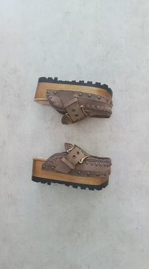 Video of handmade Oxford Vintage leather clogs in aged brown leather with hand-crocheted trim, antique brass buckle and wooden platform sole