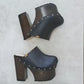 Black leather clogs with platform and super high heel. Leather mule with super high wooden heel. Black leather clogs 70's vintage style. Vintage style super high heel clogs. Sizes 34 to 47. High quality leather shoes handmade by sol Caleyo. Sustainable fashion.