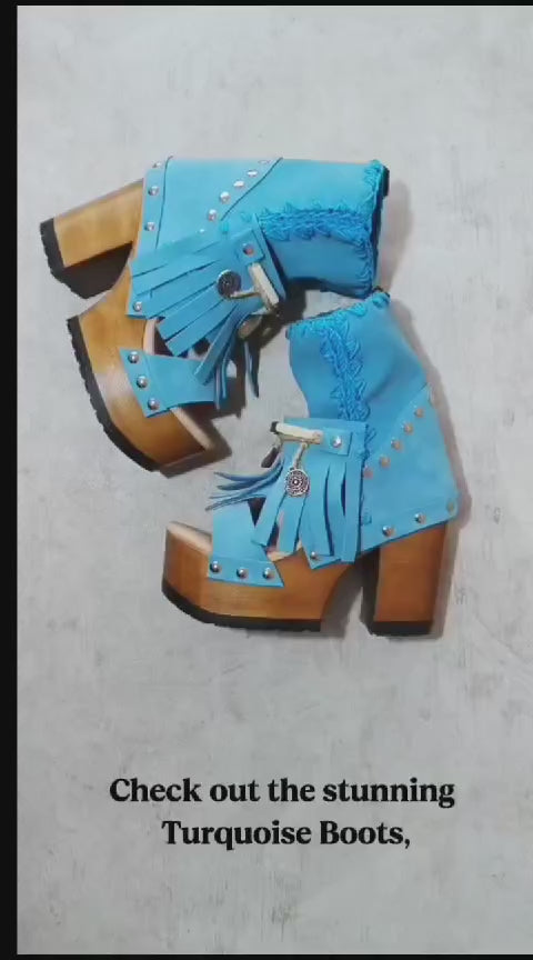 Bohemian style turquoise suede leather boots. Turquoise boots with wooden heel. Turquoise boots decorated with coins, horns and feathers, Boho Chic style. High-end handmade footwear by Sol Caleyo.