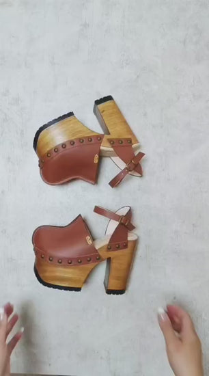Platform clogs with super high heel and vintage 70s style. Vintage style brown leather clogs. Super high wooden heel. Sizes 34 to 47. High quality handmade leather shoes.