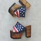 Sandals with a unique American flag design. Vintage-style platform sandals with wooden heels. Heels with a unique American flag design. High-end footwear handmade to order. Exclusive design by Sol Caleyo.