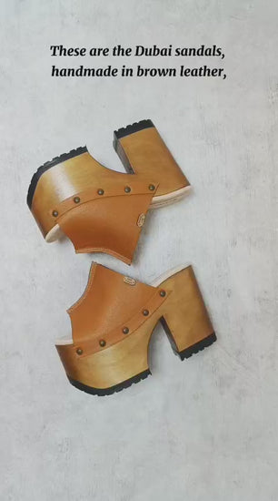 Handmade brown leather sandals, inspired by the iconic 70s style.
Crafted to order with a wooden heel and a timeless silhouette.
Available from size 34 to 47.
An exclusive design by Sol Caleyo, made for those who value craftsmanship, comfort, and authentic style.