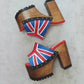 Vintage style platform sandals with wooden heel made in leather. Sizes 34 to 47. Super high wooden heel inspired by the 70s. Exclusive English flag design. High quality handmade leather footwear.