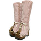 Close-up of Kozani Pink boots featuring artisanal natural horns, shells, and fringes on premium rose suede.