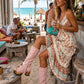 Model wearing Kozani Pink festival boots in a boho-chic summer outfit with a vintage-inspired look.
