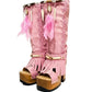 Close-up of Rhapsody Bohemia Pink Boots in premium pink suede with fringe, hand-selected feathers, and organic shells. These artisanal boho boots by Sol Caleyo feature a high hand-sculpted wooden heel and platform.