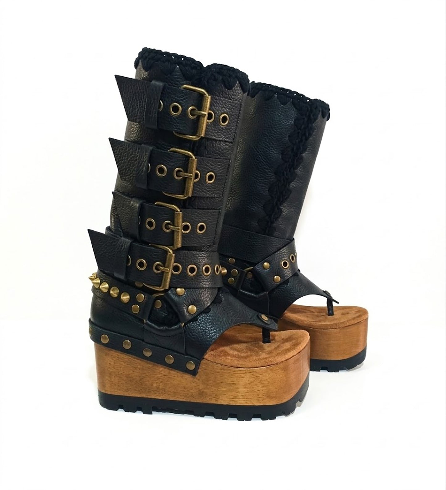 Luxury handmade Alabama Flip Flops Black Boots in black leather, showing the 10 cm wooden wedge, Vibram tractor sole, and old gold pyramid stud details.