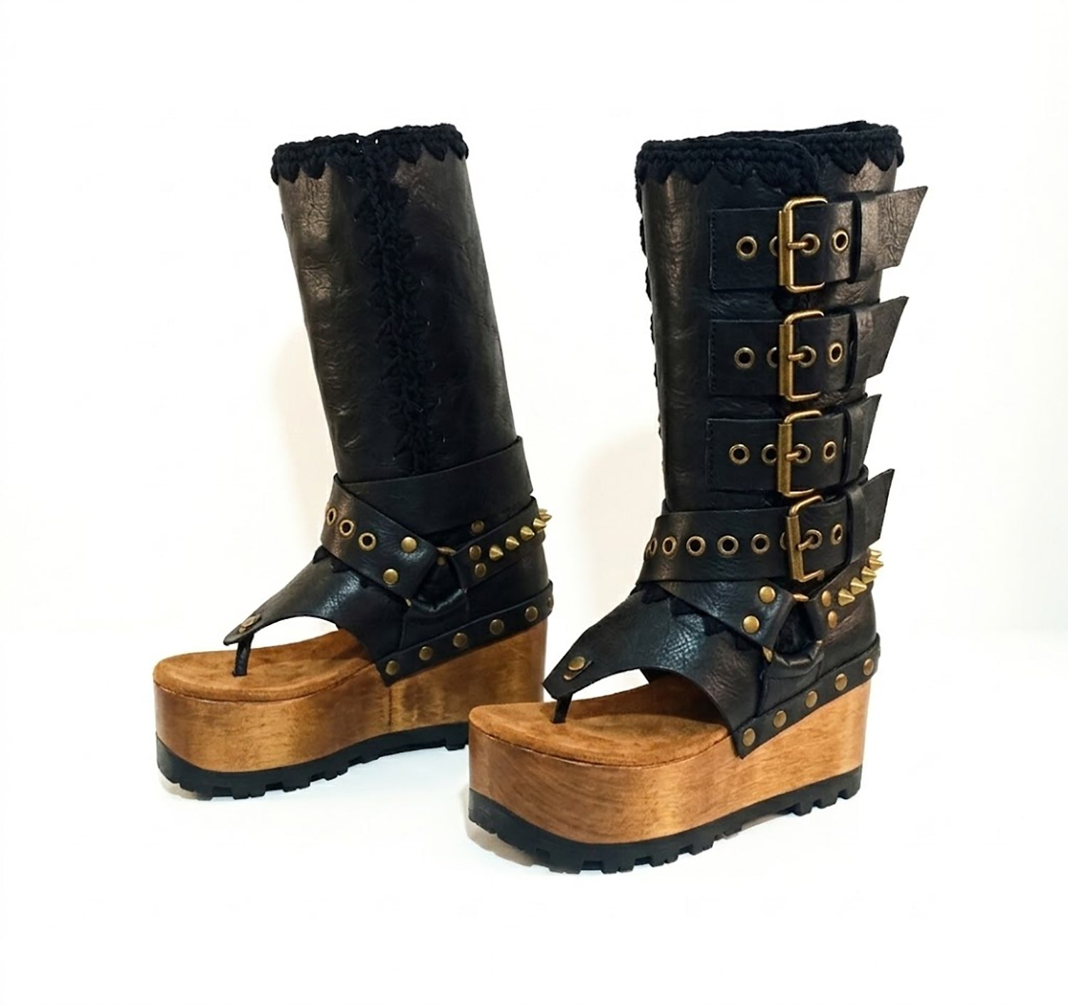 Luxury handmade Alabama Flip Flops Black Boots in black leather, showing the 10 cm wooden wedge, Vibram tractor sole, and old gold pyramid stud details.