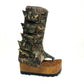 Handmade Alabama Flip Flops Army Boots in camouflage leather, featuring old gold pyramid studs, a wooden wedge, and a black Vibram tractor sole.