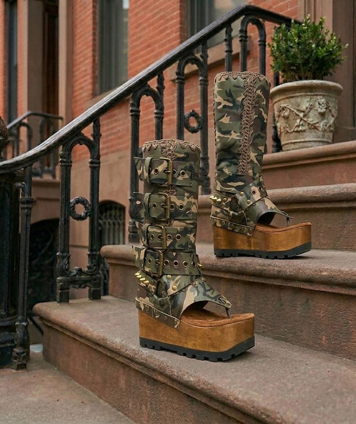 Handmade Alabama Flip Flops Army Boots in camouflage leather, featuring old gold pyramid studs, a wooden wedge, and a black Vibram tractor sole.