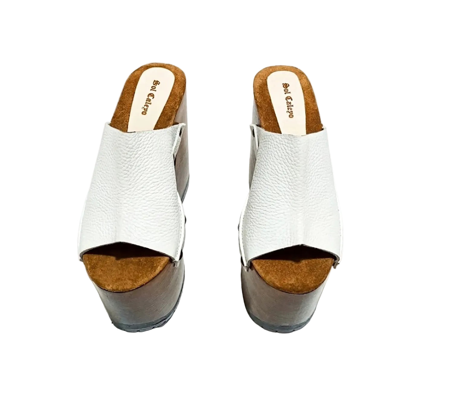 Side view of White Luxury Queen Sandals by Sol Caleyo featuring 17cm bell-style wooden heel and 11cm hand-carved platform. High-end handcrafted white leather platform sandals with vintage studs and padded goatskin suede insole. Artisanal luxury footwear for women, 100% handmade.