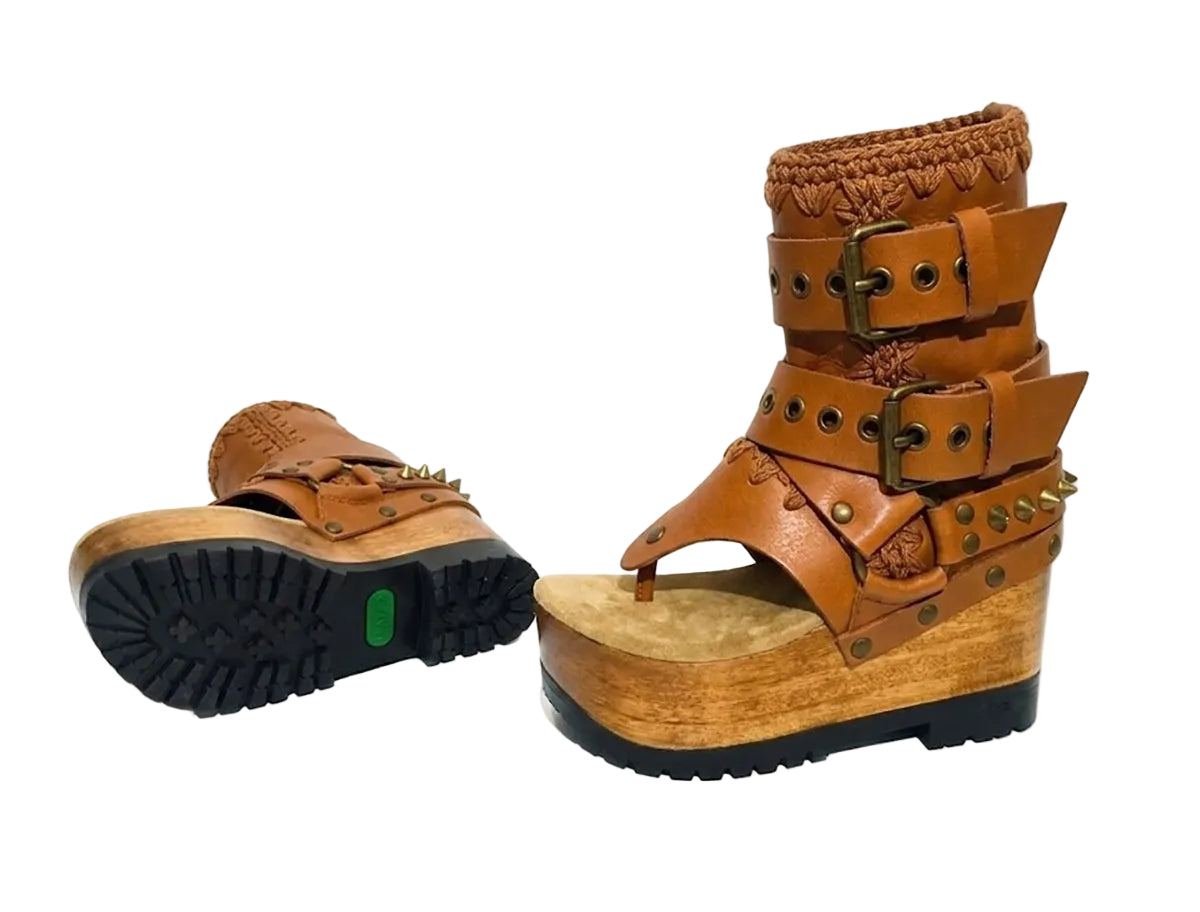 Sol Caleyo Kenya Flip Flop Camel Boots: handmade camel leather platform sandals with wooden wedge and old gold biker embellishments.