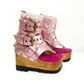 Sol Caleyo Kenya Flip Flop Pink Boots: handmade metallic pink leather platform sandals with wooden wedge, fuchsia insole, and old gold biker studs.