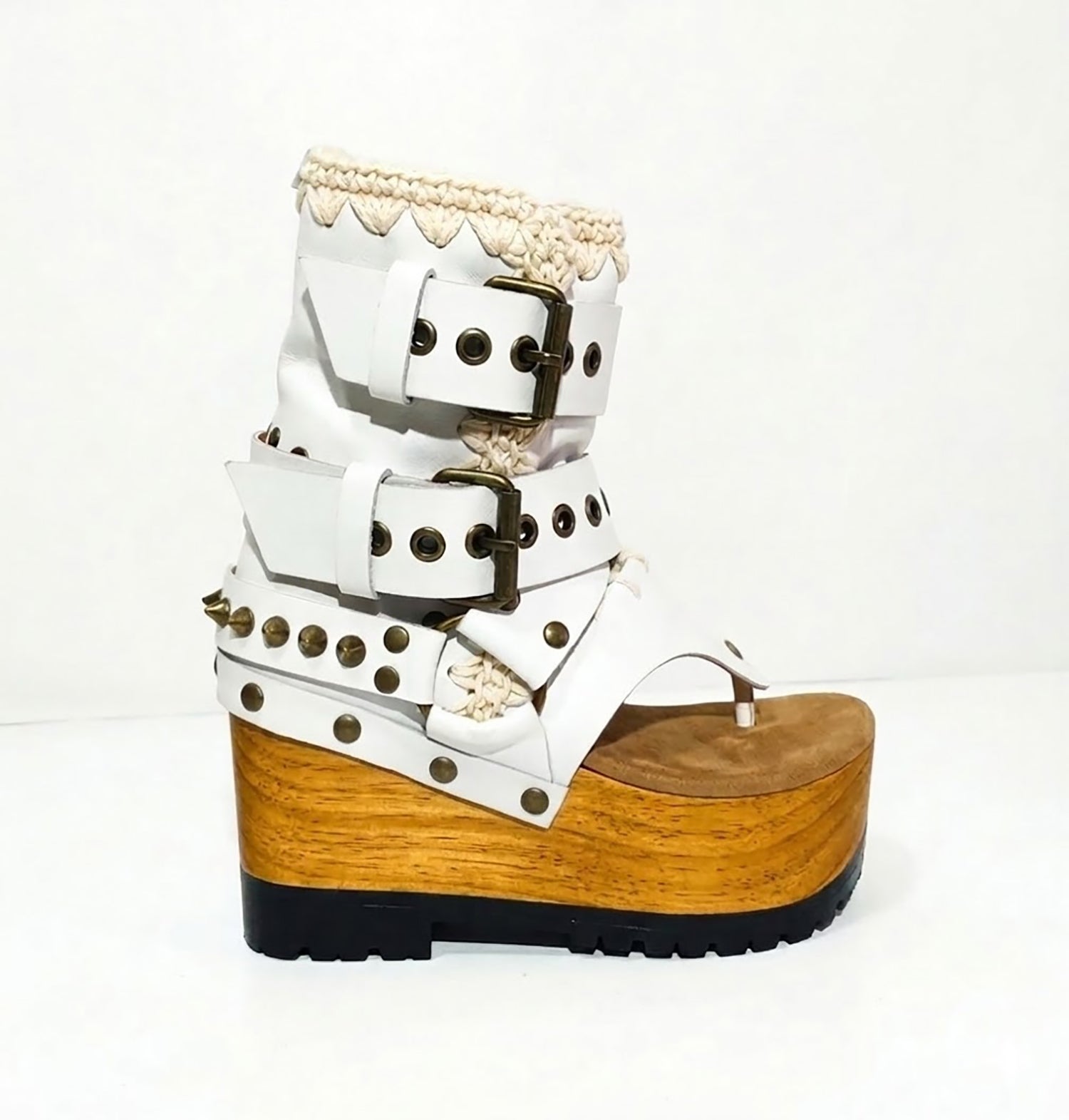 Sol Caleyo Kenya Flip Flop White Boots: handmade white leather platform sandals with wooden wedge, tractor sole, and gold biker buckles.