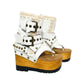 Sol Caleyo Kenya Flip Flop White Boots: handmade white leather platform sandals with wooden wedge, tractor sole, and gold biker buckles.