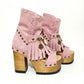 Sol Caleyo Pink Aruba Boots: handmade pink suede platform sandals with wooden heel and bohemian shell and coin decorations.
